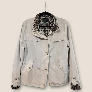 Cream and tan waterproof jacket with leopard print lining‎